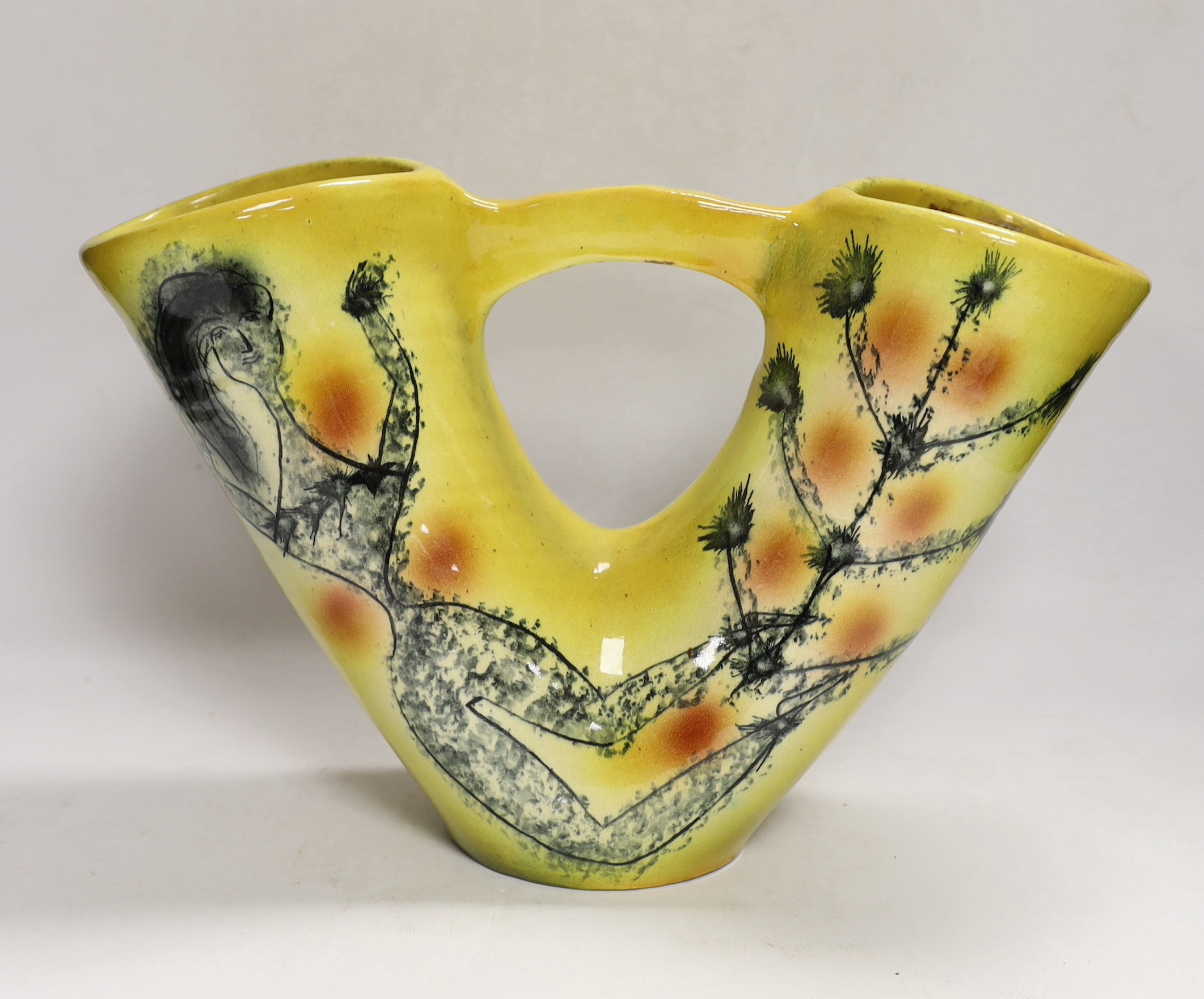 A Spanish pottery twin-stem vase on yellow ground, 24cm